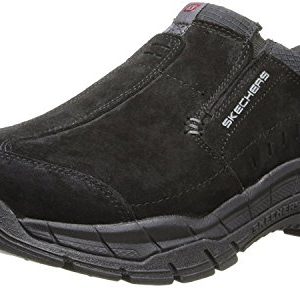 A sleek pair of Skechers Rig Mountain Top slip-on shoes in black, showcasing their soft suede upper, relaxed fit design, and Memory Foam cushioned insole for all-day comfort.