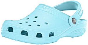 Crocs Classic Clogs in vibrant color, featuring pivoting heel strap, ventilation ports, and massage-pod footbed for maximum comfort and breathability.